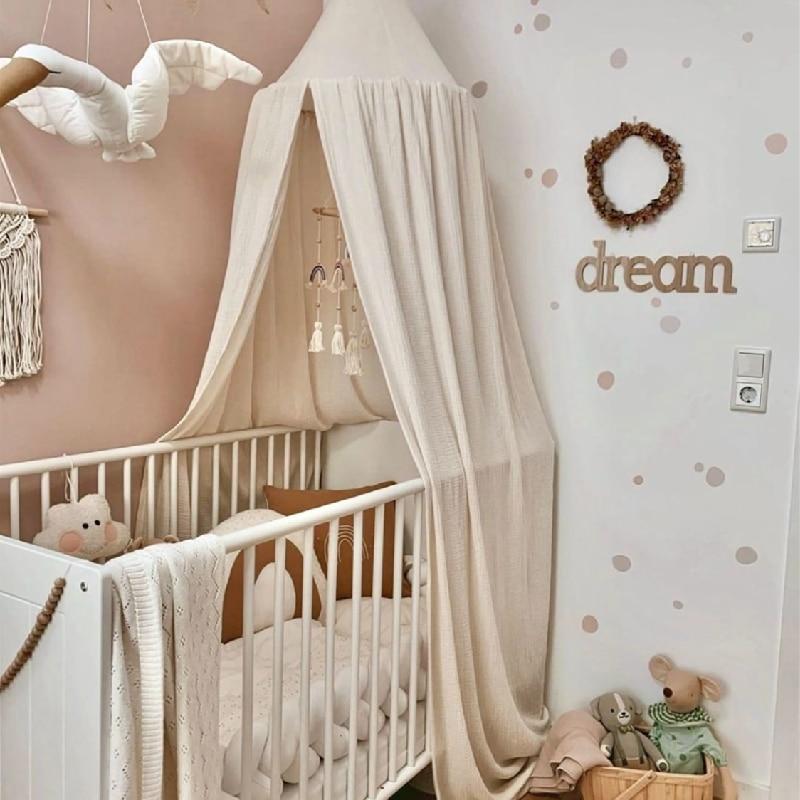 ciel de lit bébé beige